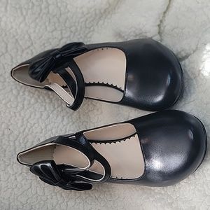 Black bow heels